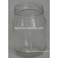 round and transparent textured glass jar